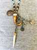 Beaded Necklace With Horn Pendant