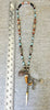 Beaded Necklace With Horn Pendant