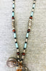 Beaded Necklace With Horn Pendant
